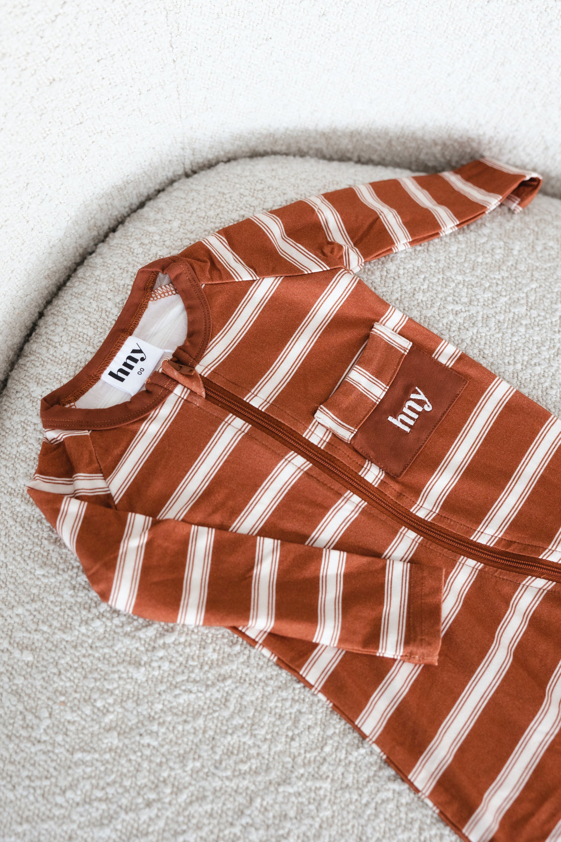 Riley Onesie White and Baked Clay